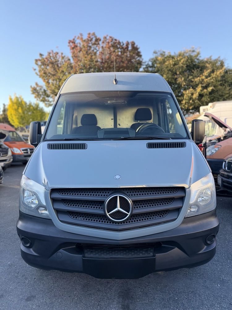 Front view of a Mercedes Sprinter in the business’s original photo collection.